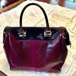 ISO Looking for Bebe deep magenta faux snakeskin purse excellent to NWTcondition
